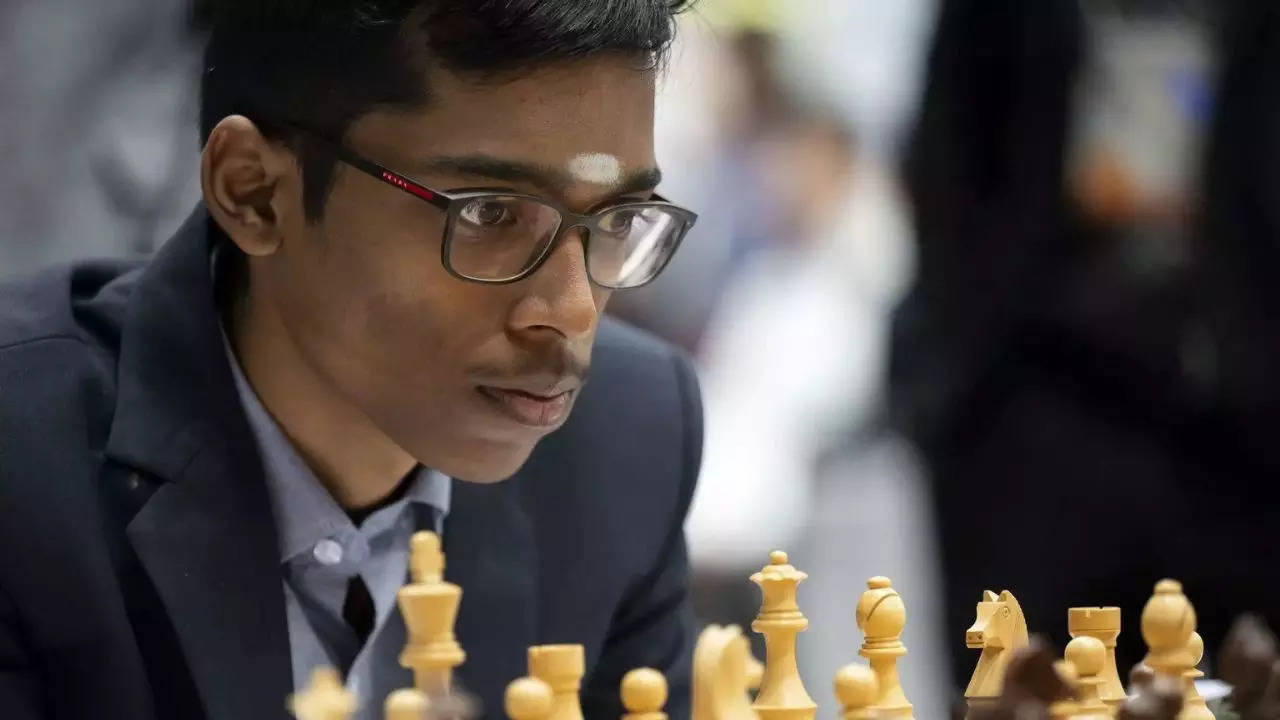 r-praggnanandhaa-triumphs-over-arjun-erigasi-to-claim-top-spot-at-tata-steel-chess-2025;-d-gukesh-holds-steady-with-a-draw!